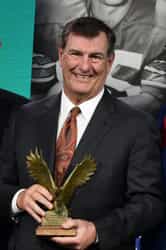 Michael Rawlings holding Folsom Eagle Award