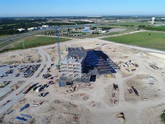 Arial photograph of the construction of Methodist Midlothian as the final beam was raised onto the roof